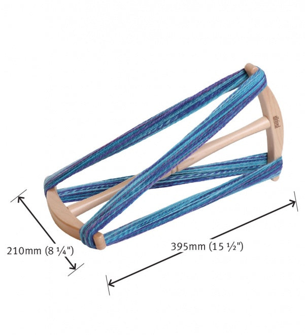 Niddy Noddy holding a blue and purple skein of yarn