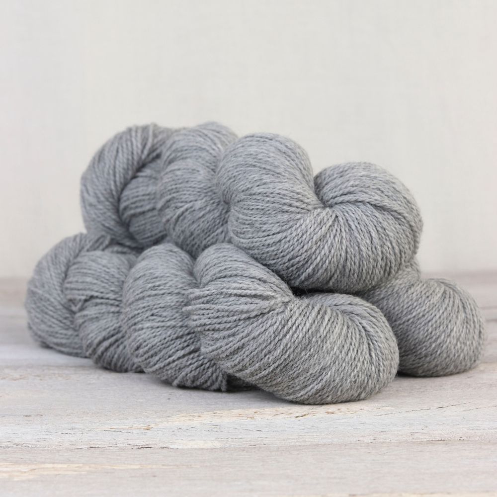 light blue-grey skeins of yarn