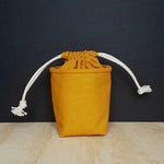 honey coloured mini drawstring bag