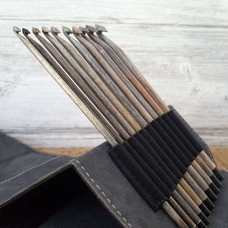 Driftwood crochet hook tips in their holders in crochet hook kit
