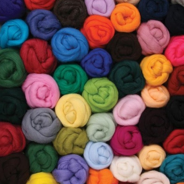 a pile of assorted coloured bumps of roving.